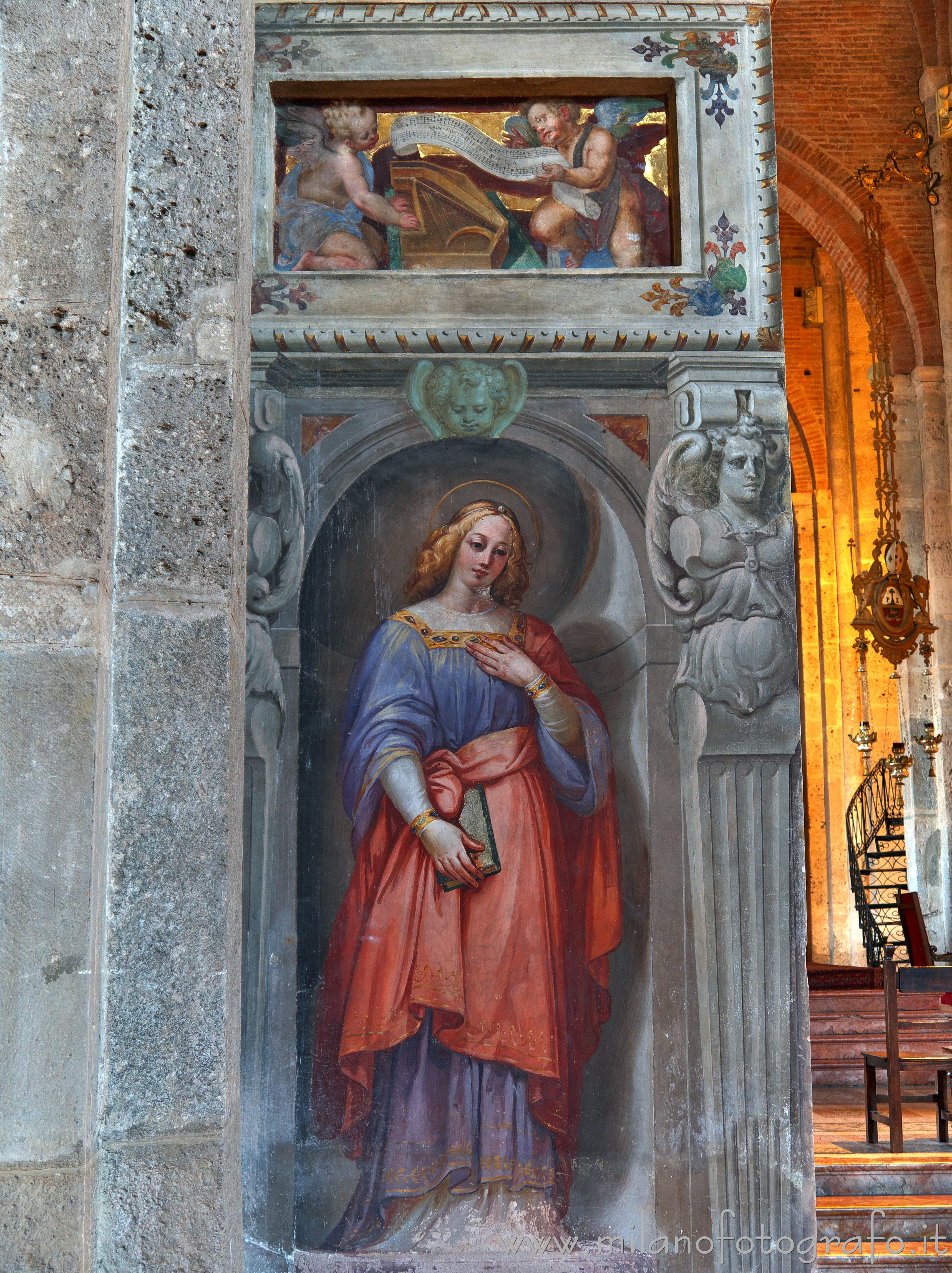 Milan (Italy) - Left side of the base of the left choir loft in the Basilica of San Simpliciano